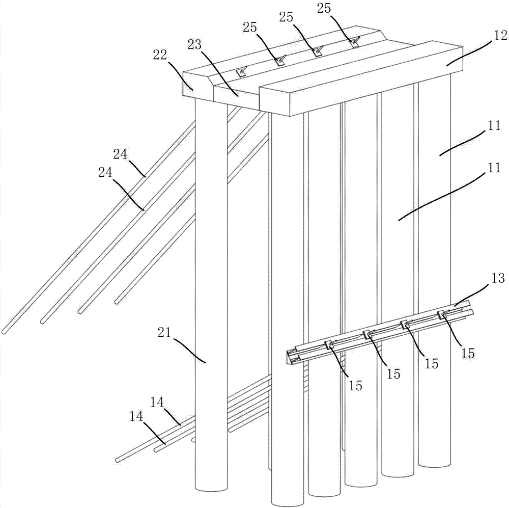 第一排桩,围设于基坑边缘,所述第一排桩包括多个间隔设置的第一支护桩